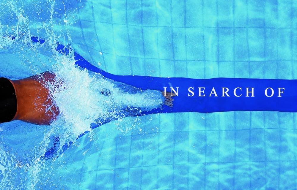 IN SEARCH OF set along a swimmer’s lane line.