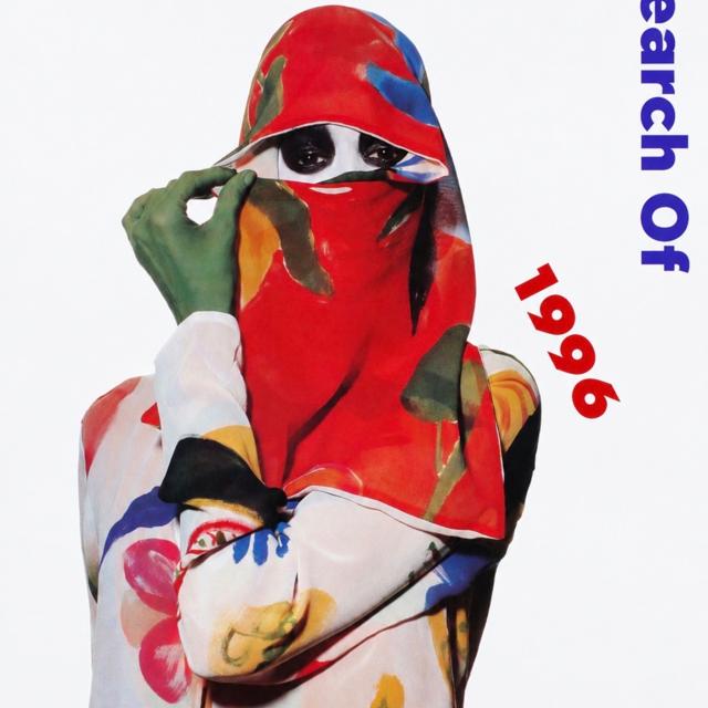 In Search Of 1996 poster: a figure in a printed hood and gloves.